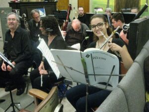 Me and my flute and piccolo in the Hudson Lyric Opera, playing my favorite opera, Tosca!