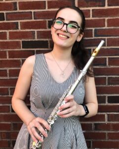 Me with my flute after finding out that I passed my Level A!